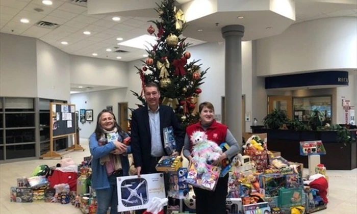 As more families struggle, Newmarket residents, employees, and companies open hearts during holidays.